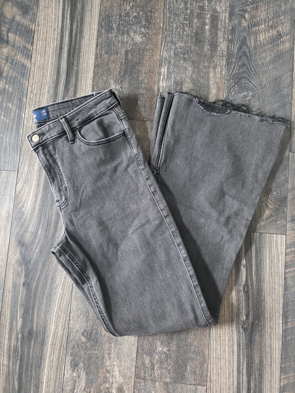 Hollister High-Rise Flared Jeans in Charcoal Grey with Raw Hem